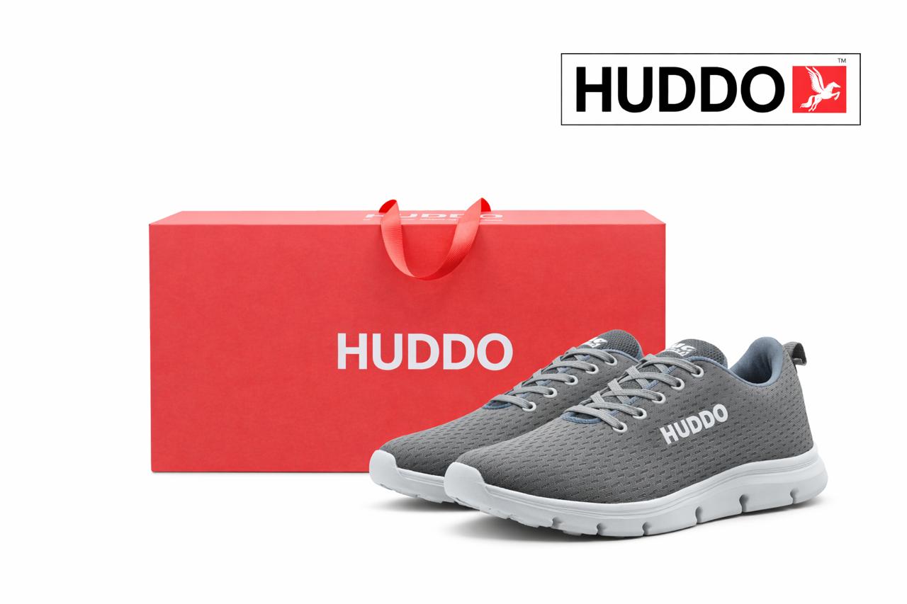 Gray running shoes with white soles and 'HUDDO' branding next to a red box with 'HUDDO' branding on a white background.